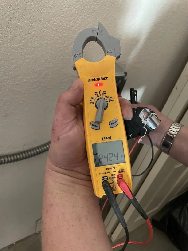Voltage testing with clamp meter during Aluminum Wiring Replacement in Wonder Lake